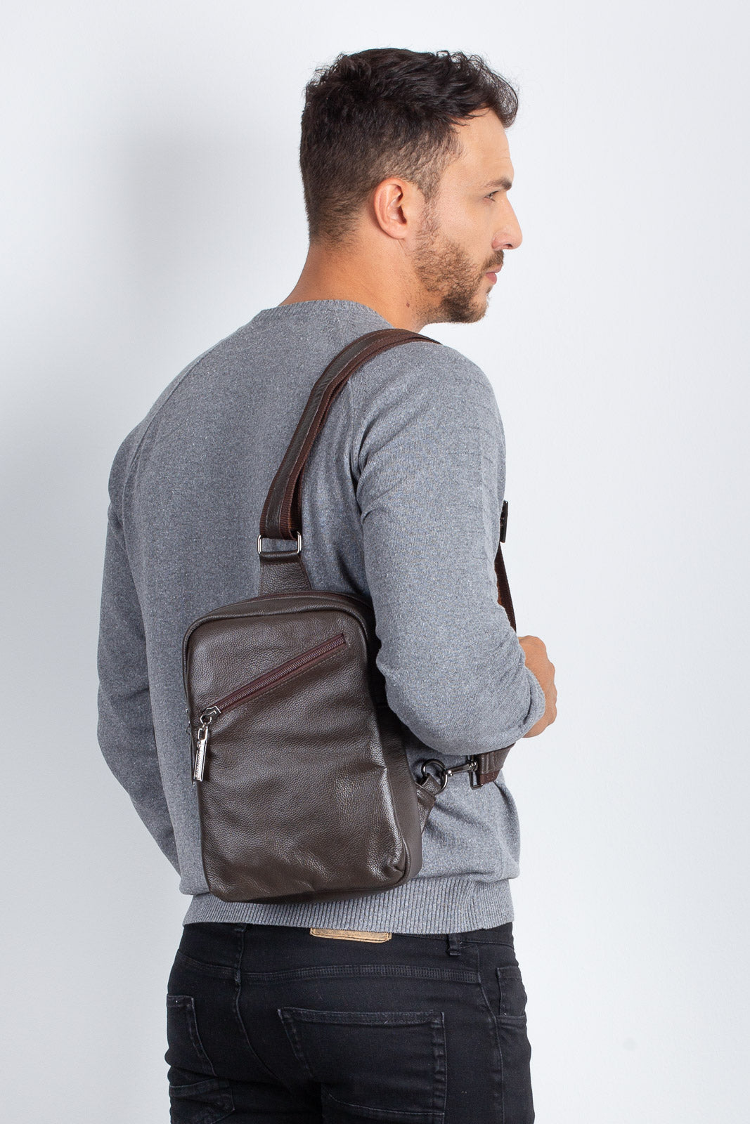 Mini mochila transversal de couro Eric