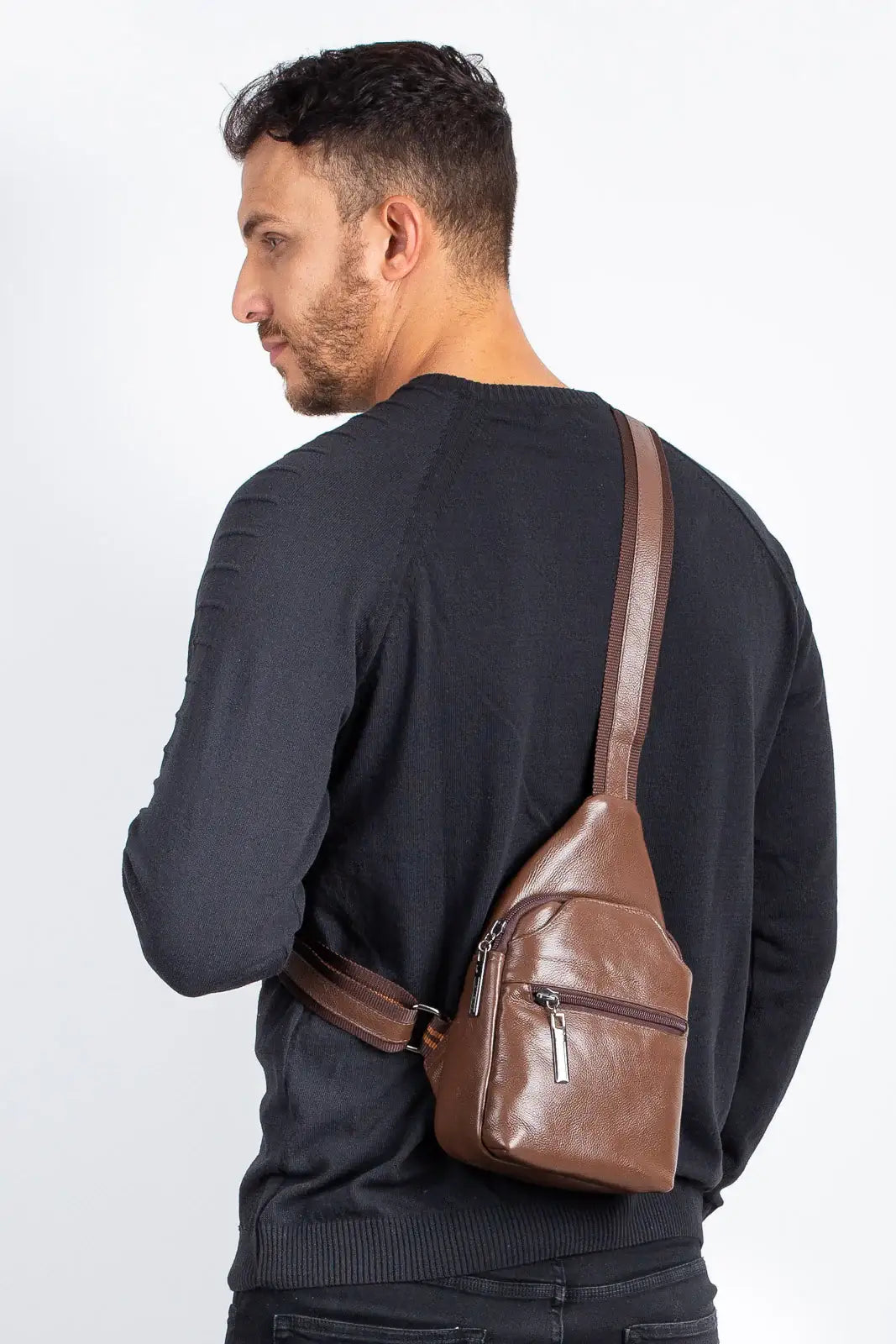 Mini mochila transversal de couro Jeff - Enluaze