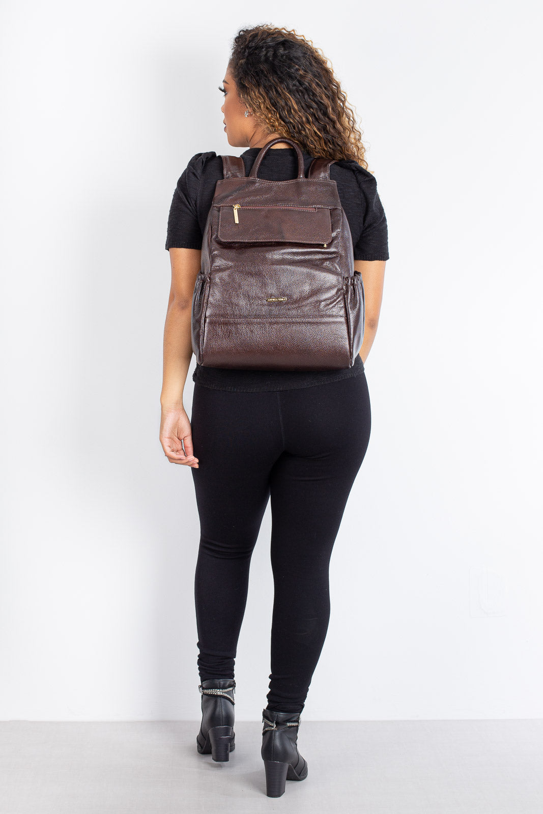 Mochila antifurto de couro liso Suelen