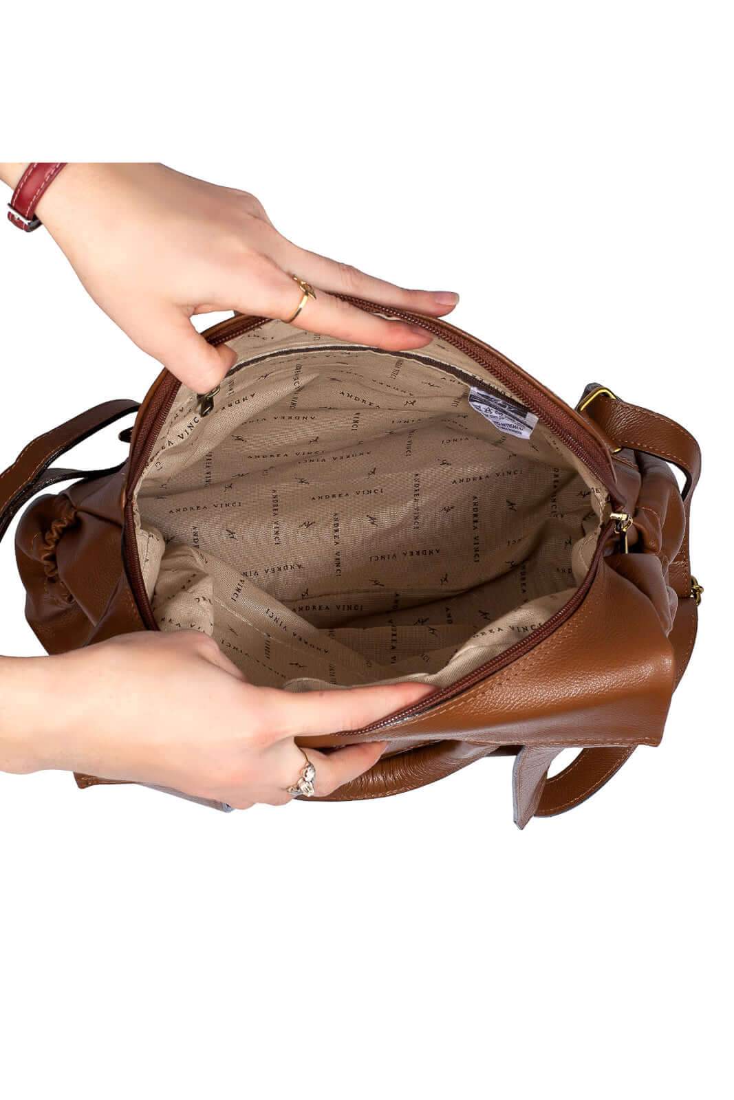 Mochila antifurto de couro liso Suelen - Enluaze