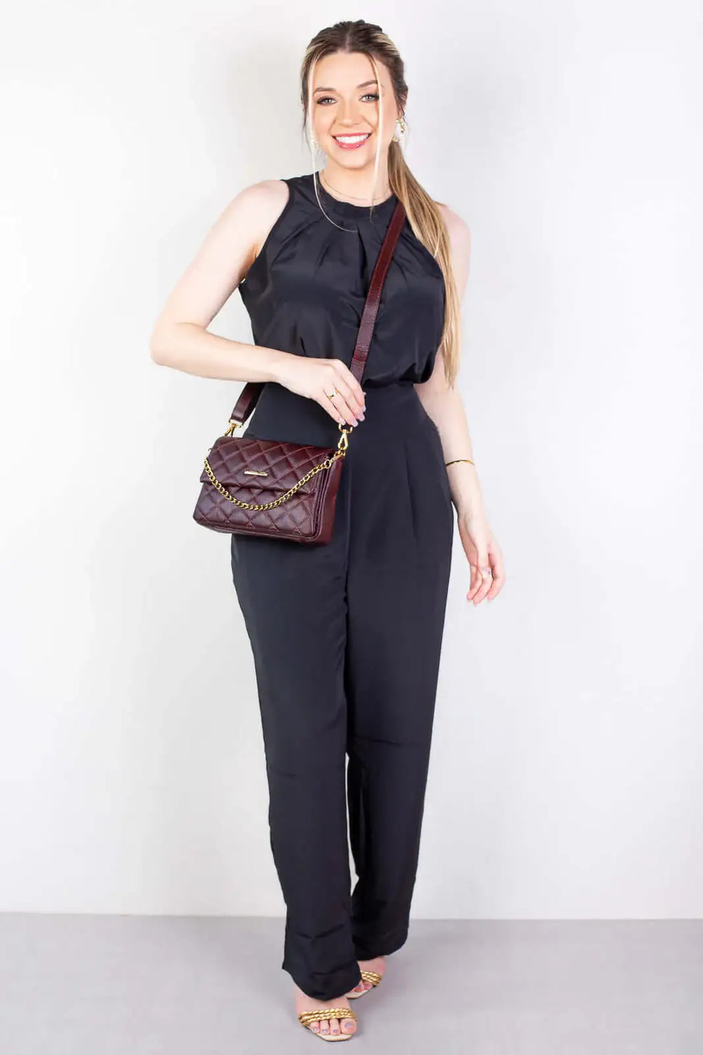 Bolsa de couro com corrente matelassê Giulia - Enluaze