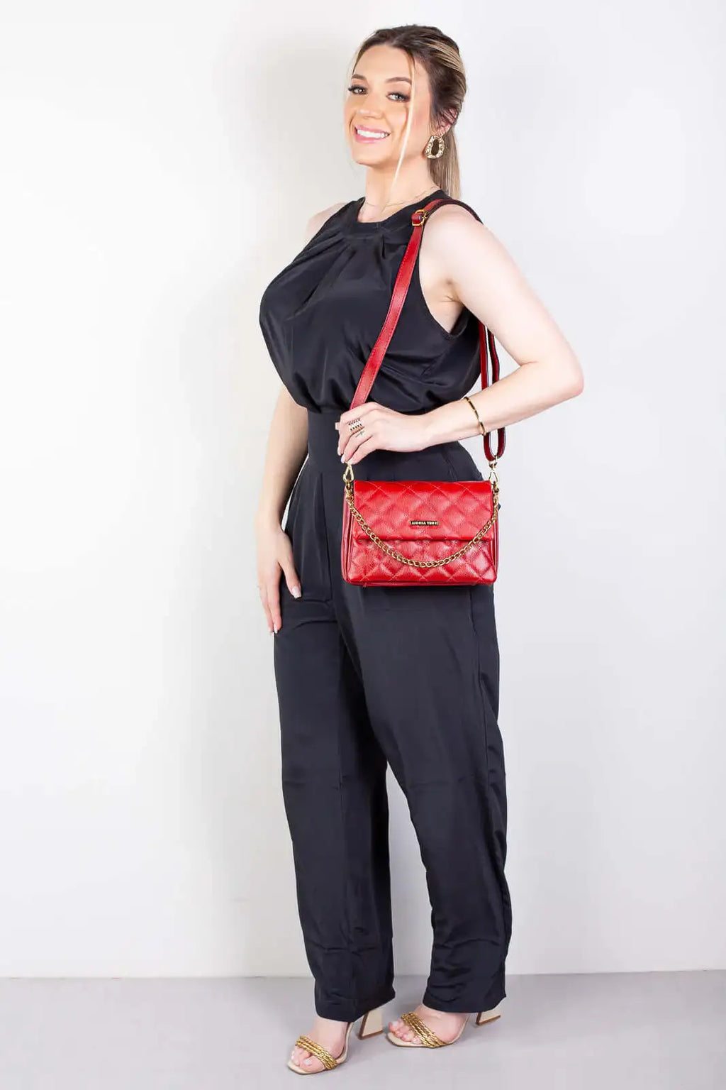 Bolsa de couro com corrente matelassê Giulia - Enluaze