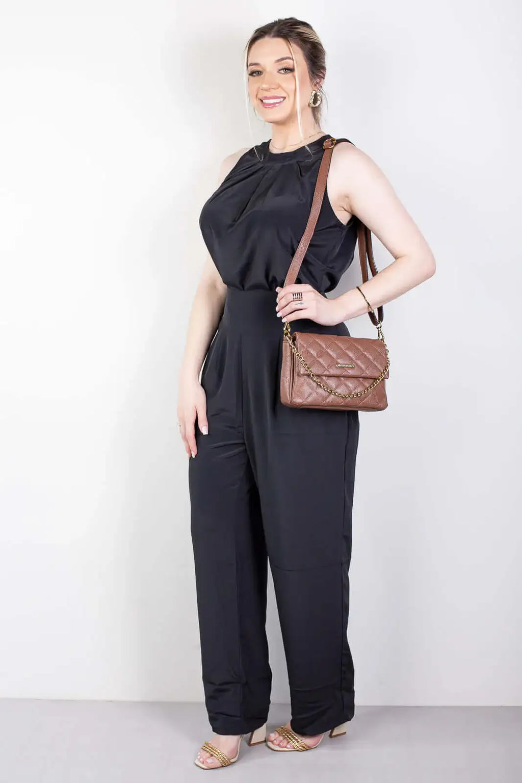 Bolsa de couro com corrente matelassê Giulia - Enluaze