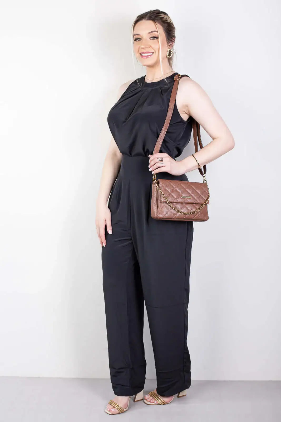 Bolsa de couro com corrente matelassê Giulia - Enluaze