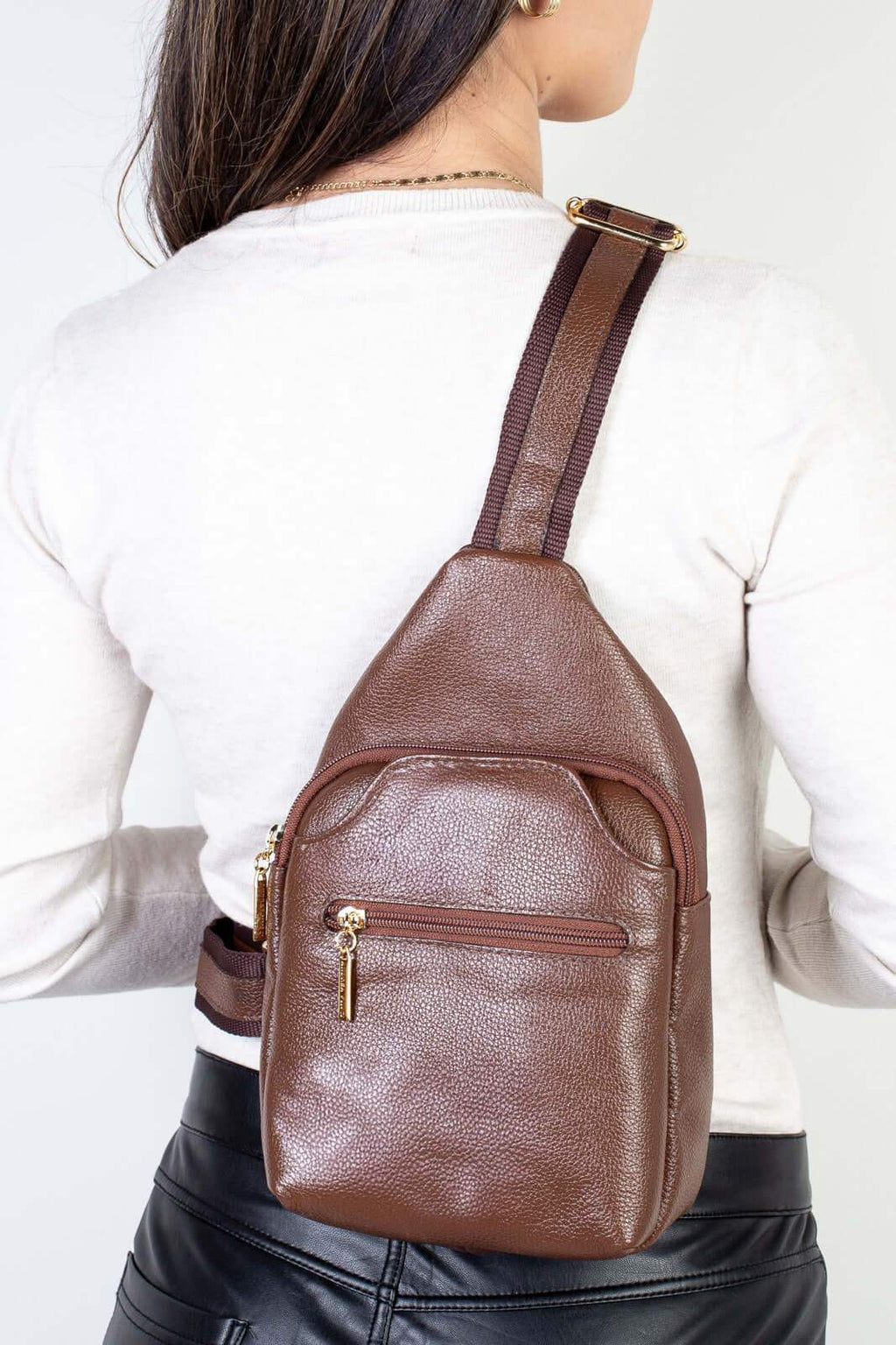 Mini mochila feminina transversal de couro liso Jenny - Enluaze