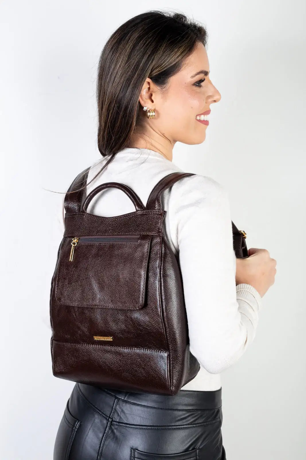 Mochila pequena antifurto couro liso Susan - Enluaze