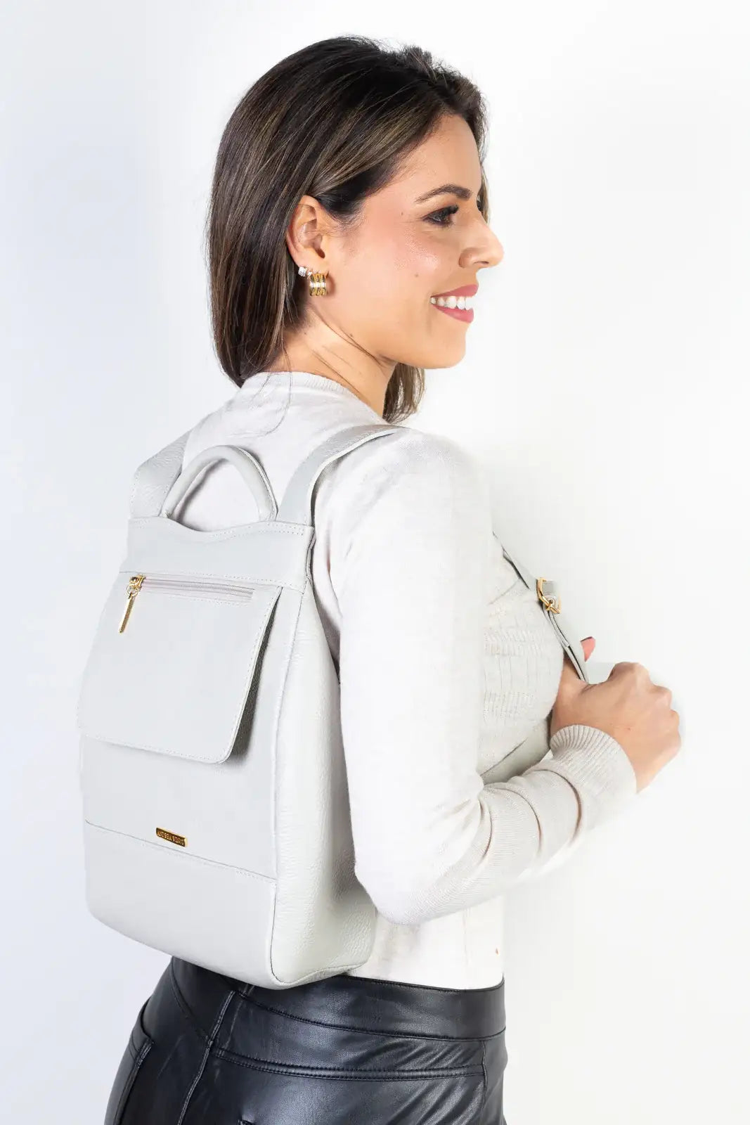 Mochila pequena antifurto couro liso Susan - Enluaze