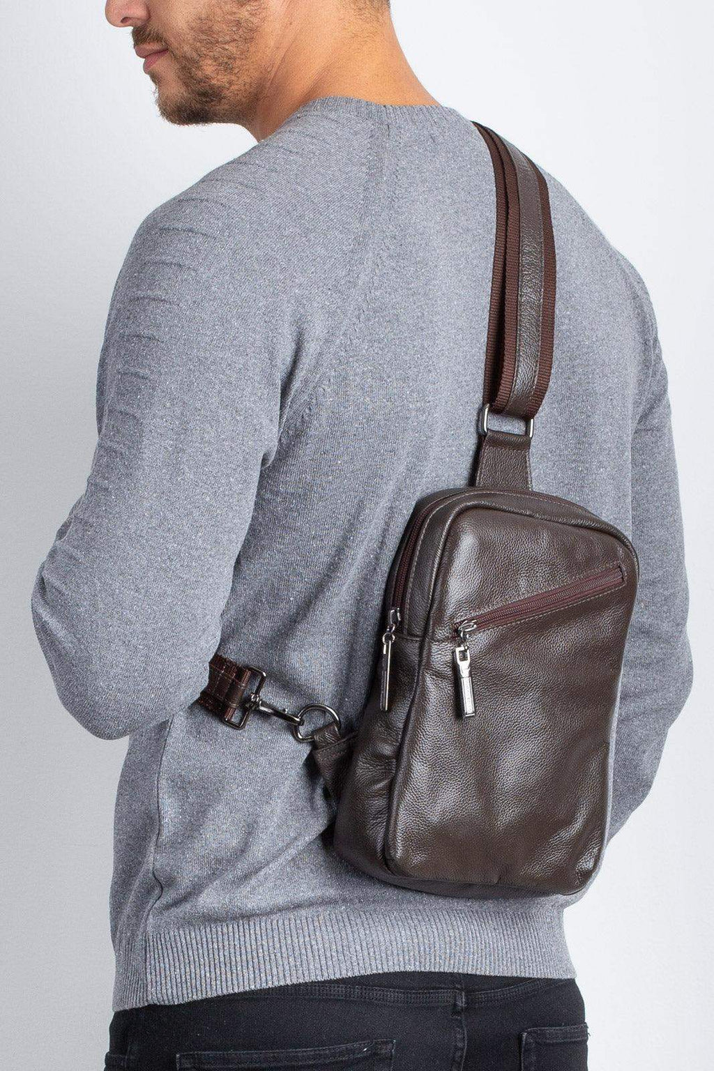 Mini mochila transversal de couro Eric - Enluaze