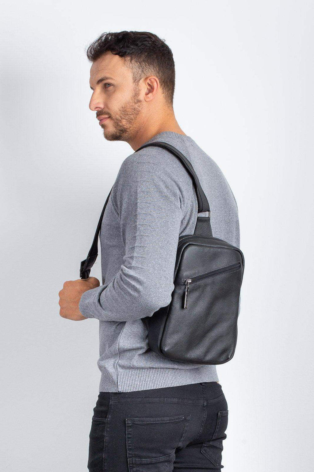 Mini mochila transversal de couro Eric - Enluaze