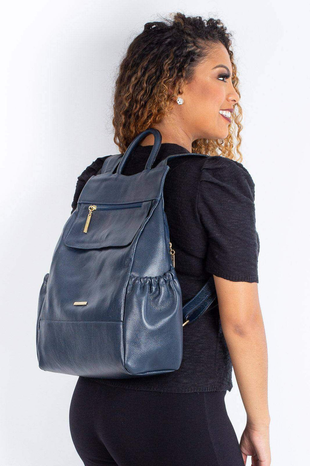 Mochila antifurto de couro liso Suelen - Enluaze