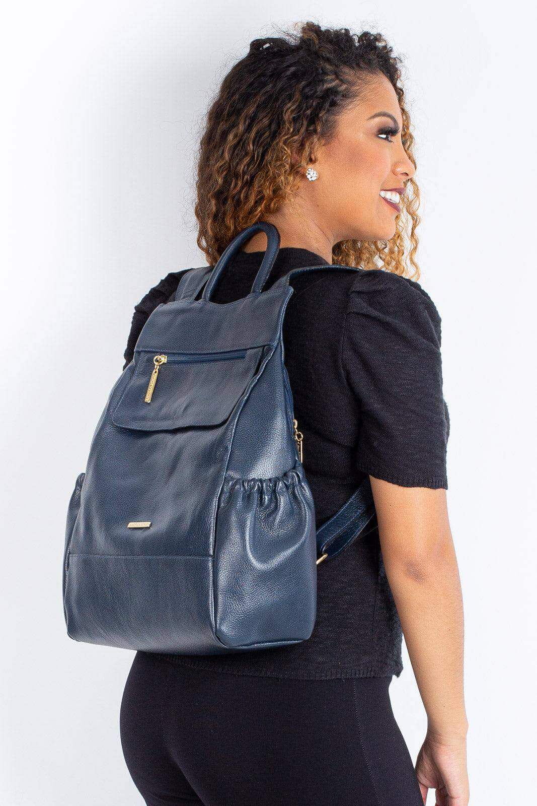 Mochila antifurto de couro liso Suelen - Enluaze