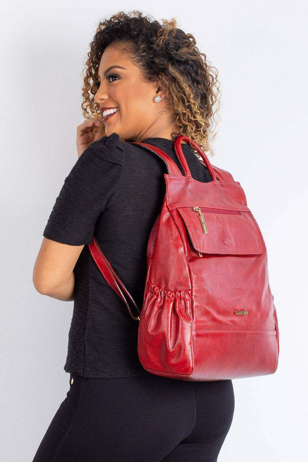 Mochila antifurto de couro liso Suelen - Enluaze