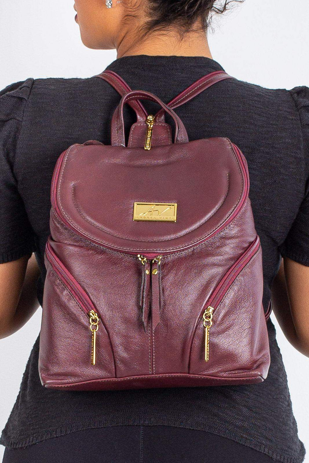 Mochila pequena de couro liso Cecília - Enluaze