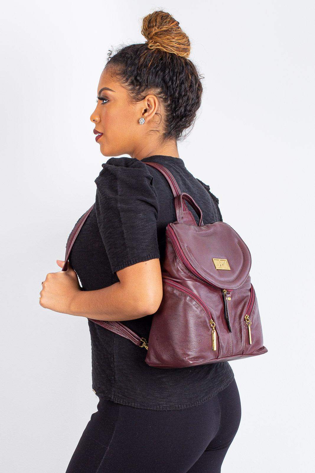 Mochila pequena de couro liso Cecília - Enluaze