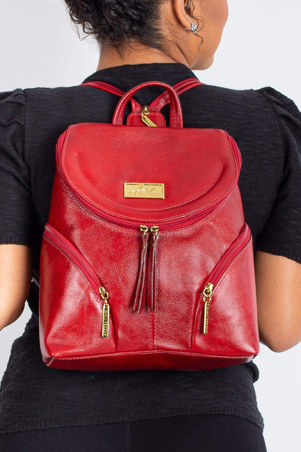 Mochila pequena de couro liso Cecília - Enluaze