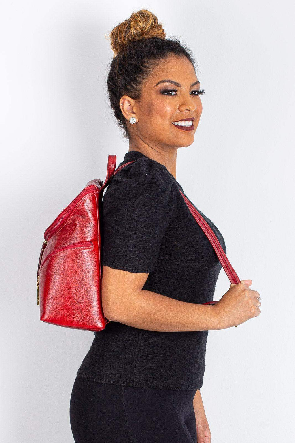 Mochila pequena de couro liso Cecília - Enluaze