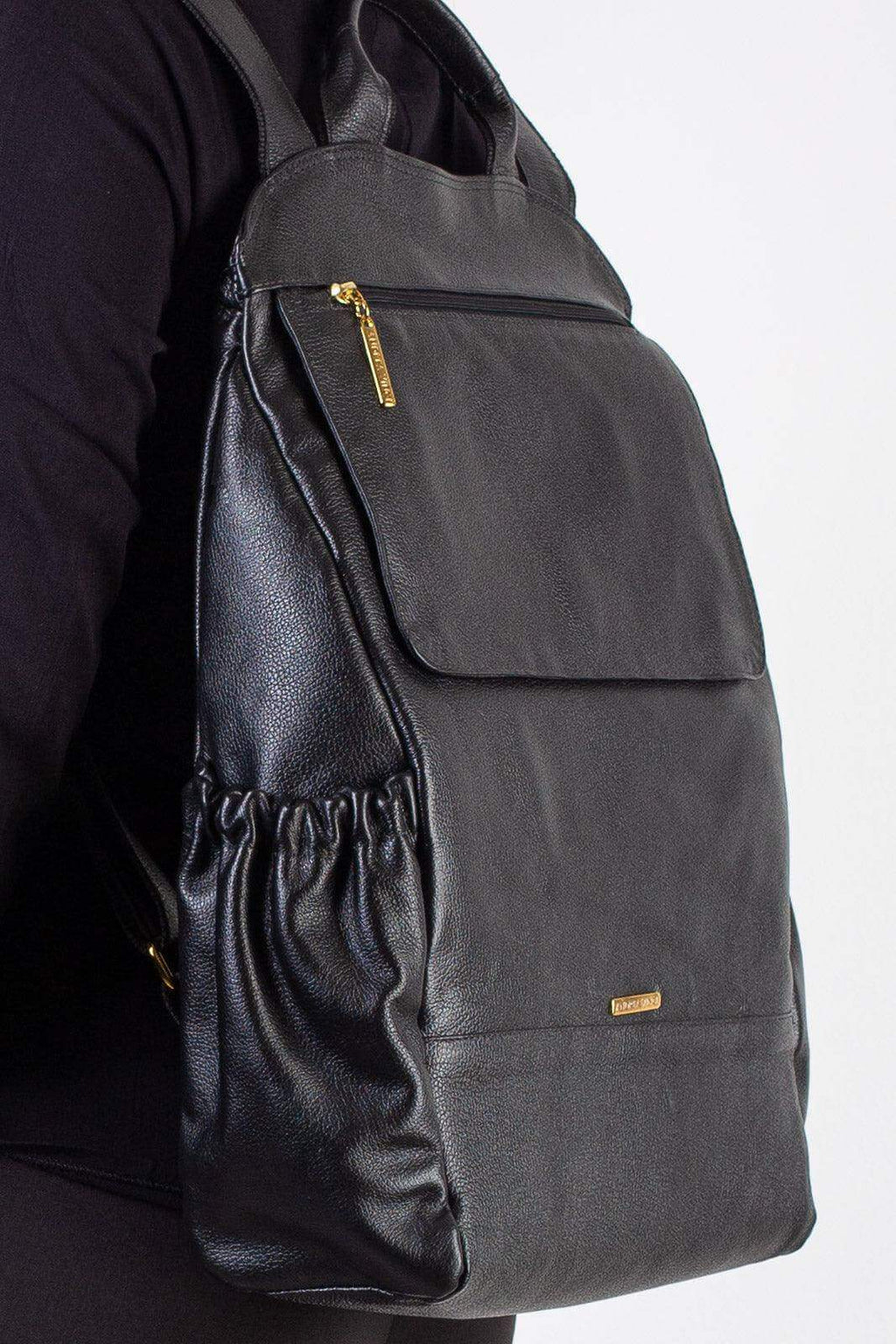 Mochila antifurto grande de couro liso Suzana - Enluaze