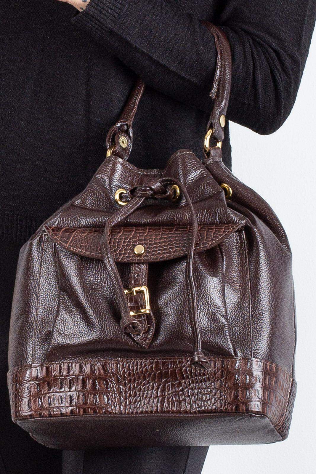 Bolsa saco em couro liso Natasha - Enluaze