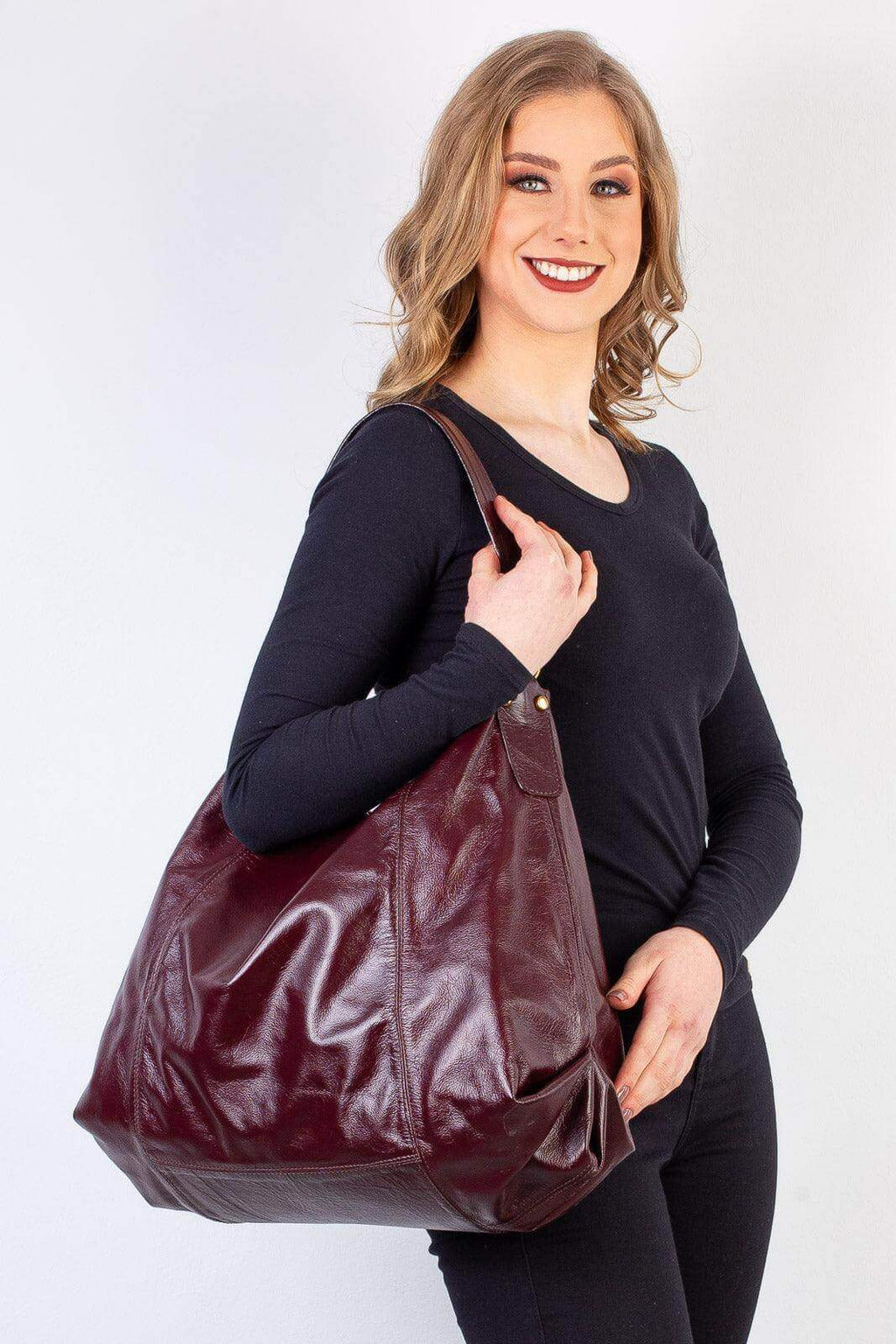 Bolsa saco grande de couro liso Cris - Enluaze